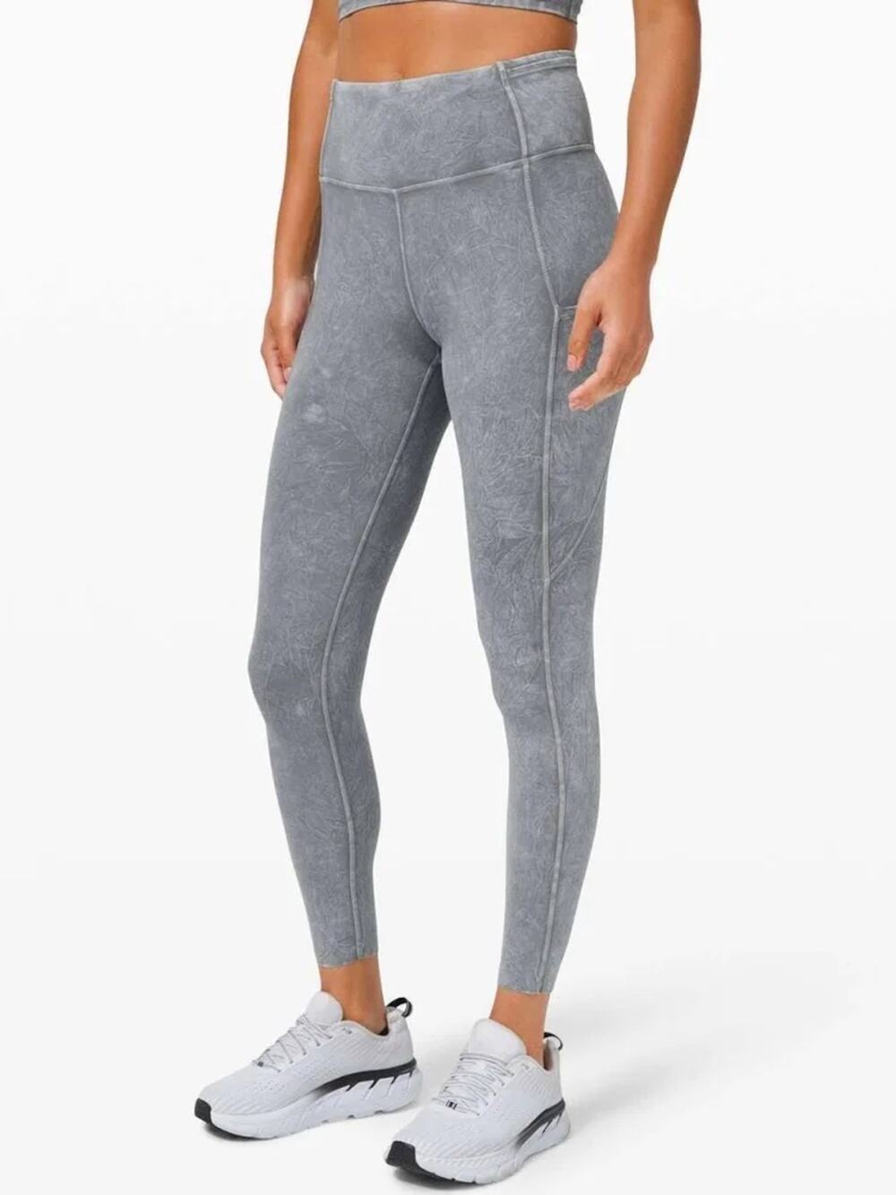 Lululemon Fast and Free High-Rise Tights in a grey "ice dye" wash